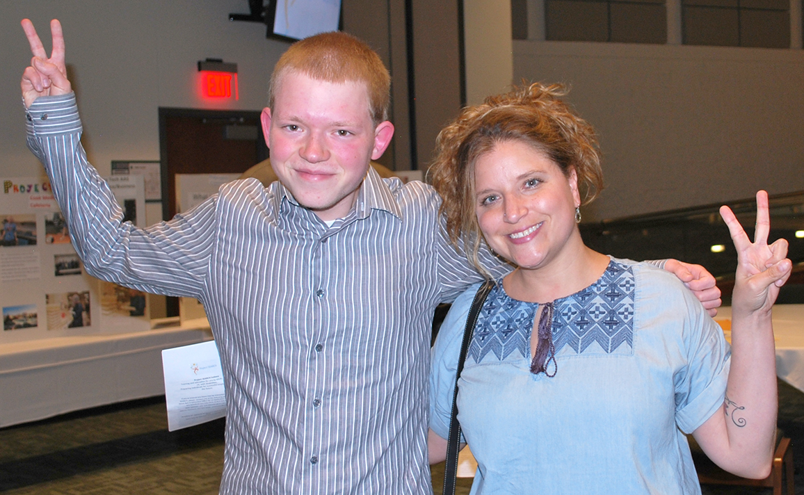 Thomas Phillips, shown with staff Carol Persley, participated in Project SEARCH, a program through which he was hired by Ivy Tech.